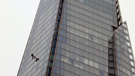 Prince Andrew begins the abseil earlier today.