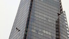 Prince Andrew begins the abseil earlier today.