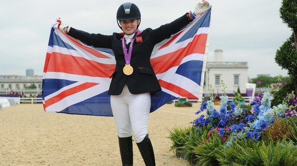 Natasha Baker pictured after winning her first gold in g the Dressage Individual Championship Test Grade II on Saturday