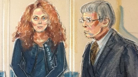 Artist's impression of Rebekah Brooks and District Judge Howard Riddle