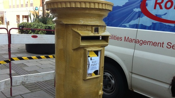 Paint dries on Ellie Simmonds gold post box in Walsall