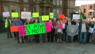Protesters at a bus stop in Hanley, Stoke-on-Trent