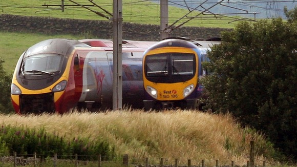 Two Virgin trains on the West Coast Main Line