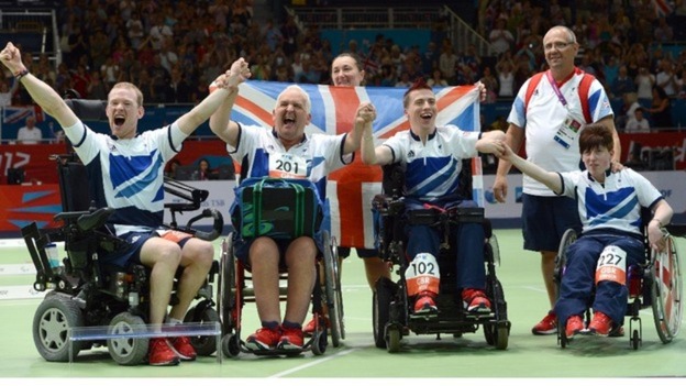 Daniel Bentley, Nigel Murray, David Smith and Zoe Robinson celebrate winning bronze during the Boccia mixed team BC1-2 bronze medal match