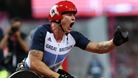 Great Britain's David Weir pumps his fist after winning gold in the men's 1500m T54 final.