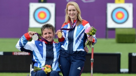 Mel Clarke (left) and Danielle Brown (right) celebrate at the Royal Artillery Barracks in London.