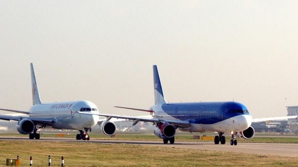 Planes queuing to take off on the Southern runway at Heathrow Airport.