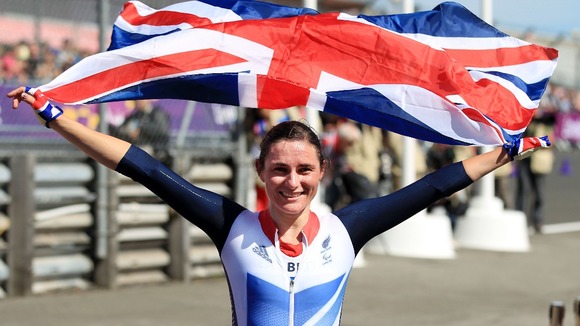 Sarah Storey with a GB flag paralympics time trial