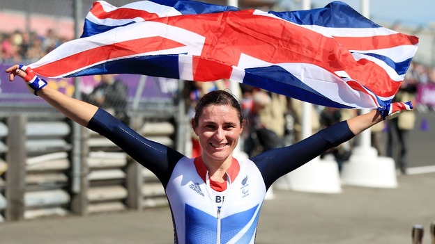 Sarah Storey with a GB flag paralympics time trial