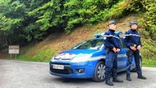 Gendarmes stand guard