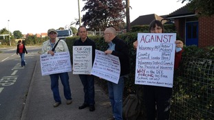 Protestors outside the Beccles Free School which opened today