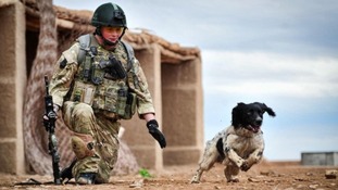 Theo in action with Lance Corporal Liam Tasker before they both died in Afghanistan