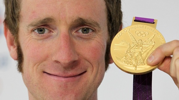 Bradley Wiggins with Olympic gold medal