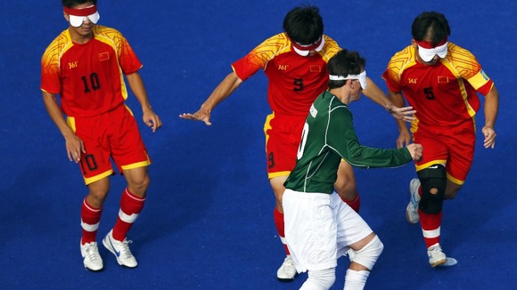 Ricardo Steinmetz of Brazil (pictured in the green shirt) in action against China.