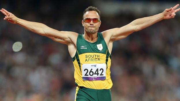 Oscar Pistorius celebrates winning Gold in a new Paralympic Record time during the Men's 400m - T44 Final