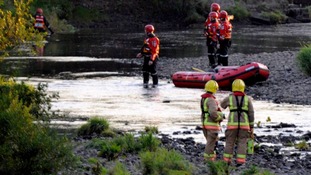 A search and rescue operation in the river at Bishop Auckland.
