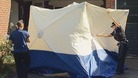 Police erect a tent outside the al-Hilli home in Claygate, Surrey