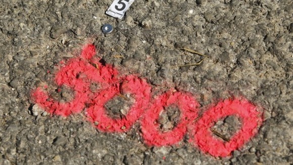 A mark left on the road at the murder scene near Chevaline in the French Alps