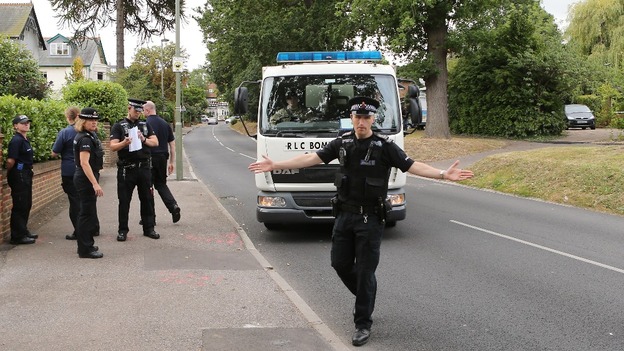 A Royal Logistic Corps bomb disposal truck arrives at the cordon close to the home of Saad al-Hilli in Claygate, Surrey