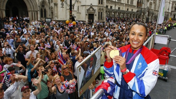 Heptathlete Jessica Ennis takes part in a parade passed the Royal Courts of Justice, London.