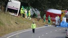 Emergency services at the scene the coach crash on the A3 near Hindhead in Surrey.