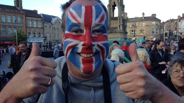 Crowds line streets to welcome athletes home