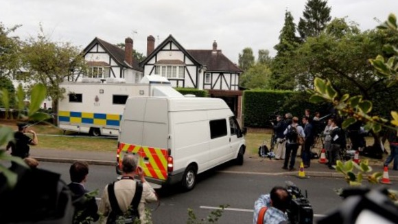 Surrey Police outside the home of Saad Al-Hilli in Claygate on Monday.