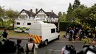 Surrey Police outside the home of Saad Al-Hilli in Claygate on Monday.