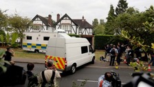 Surrey Police outside the home of Saad Al-Hilli in Claygate on Monday.