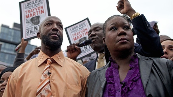 The parents of Florida teen Trayvon Martin join a protest to demand justice for their son's death, in New York's Union Square