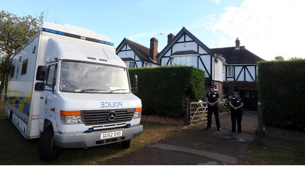 Surrey Police outside the home of Saad Al-Hilli in Claygate, Surrey.
