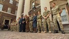 Troops gathered at Admiralty House to receive their honours.