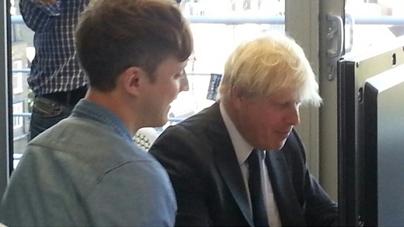 Boris Johnson at a computer.