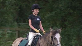 A girl horseriding.