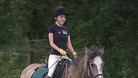 A girl horseriding.