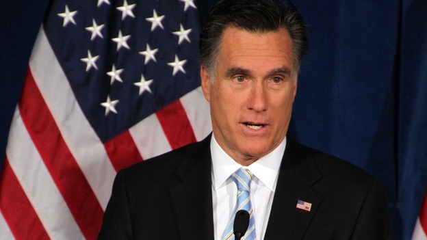 Mitt Romney has dialled down his criticism of the Obama administration over the Libya attacks