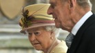 Queen Elizabeth arrives with Prince Philip to address both Houses of Parliament at Westminster Hall in London March 20