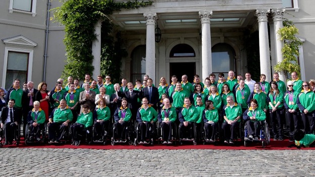 Members of Ireland's Paralympic team pose for a group picture alongside government officials.