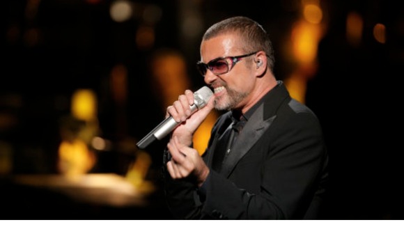 George Michael performs at a charity concert