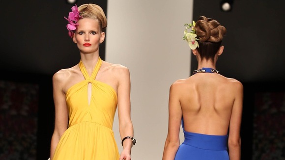 Model's take to the catwalk at Issa's show