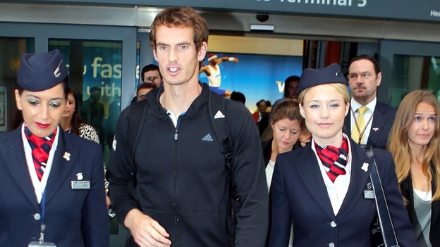 Andy Murray pictured arriving in London after his US Open victory on Wednesday.