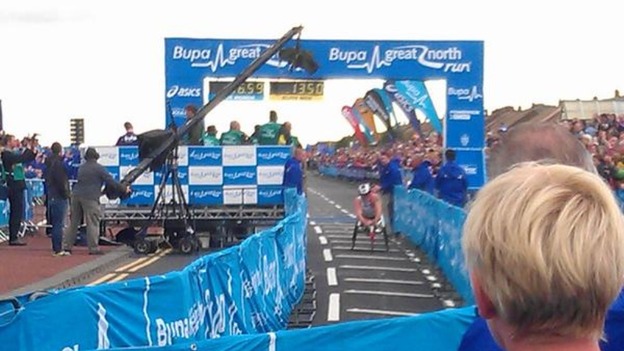 Josh Cassidy wins the Men's Wheelchair race