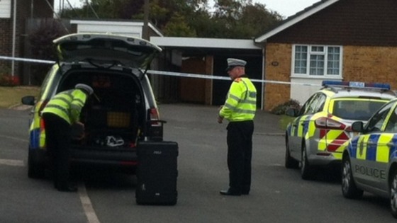 Officers arrive to analyse the scene in East Sussex.