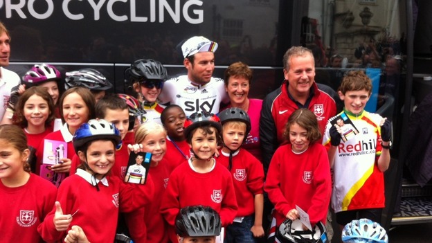 Cyclist Mark Cavendish meets pupils from Reigate Priory Junior School.