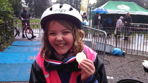 Cyclist with medal