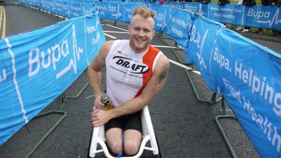 Josh Cassidy wins the Men's Wheelchair race