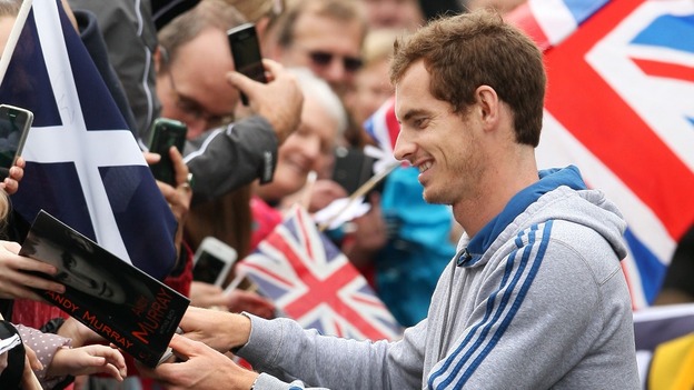 Thousands of people lined the streets to greet the US Open and Olympic champion.