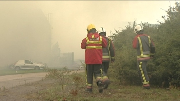 Fire crews are still working to extinguish a blaze at a woodyard in Derby