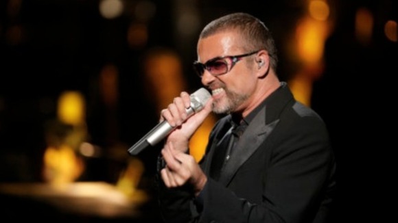 George Michael performs at a charity concert
