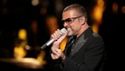 George Michael performs at a charity concert